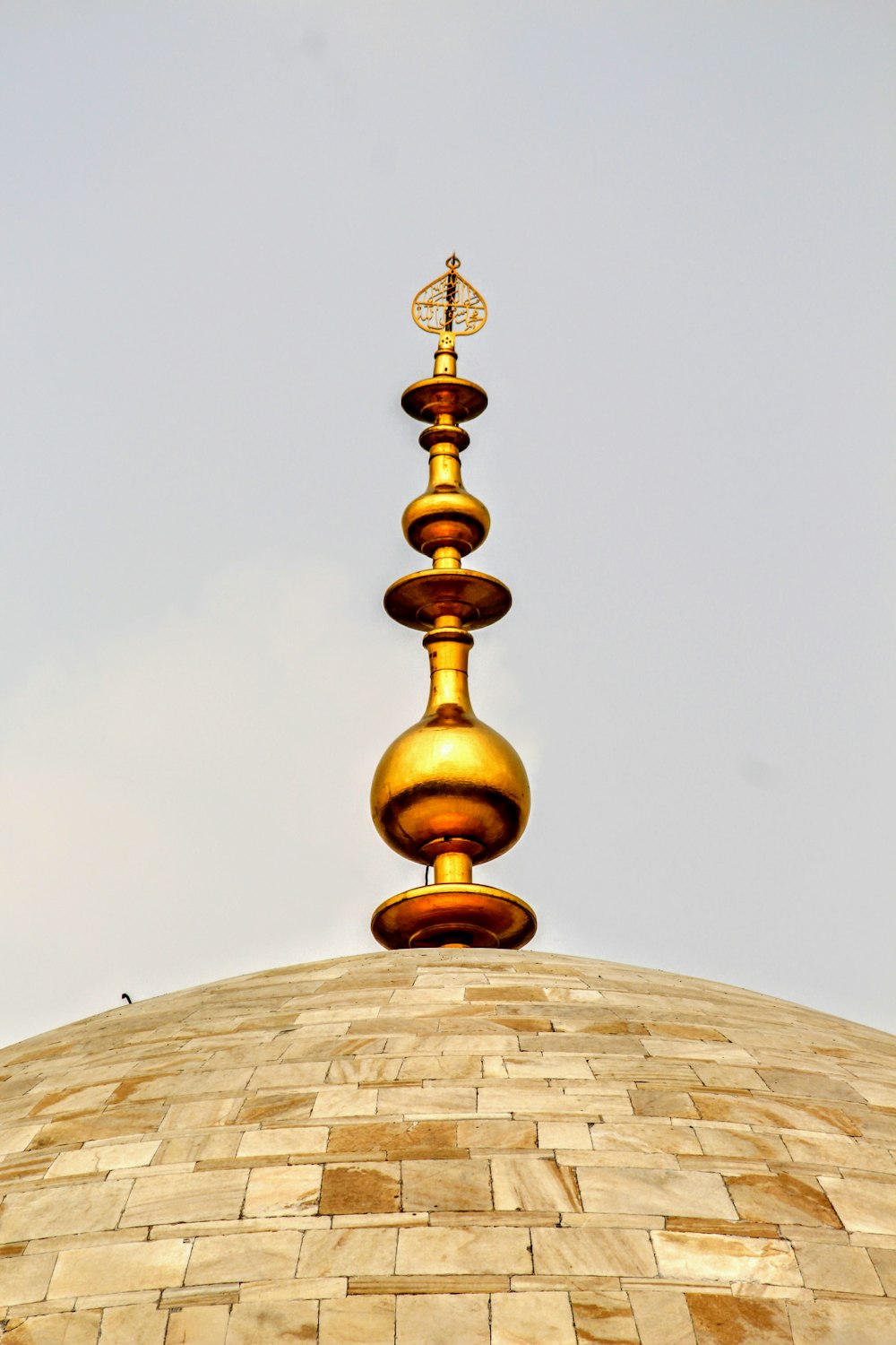 brass-colored building tower