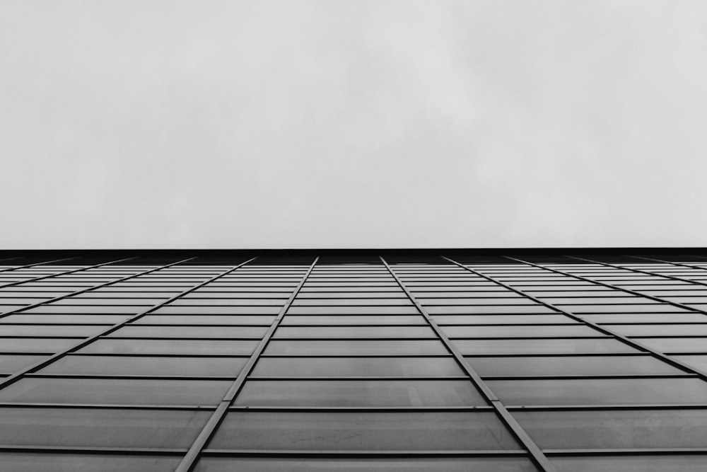 a black and white photo of a tall building