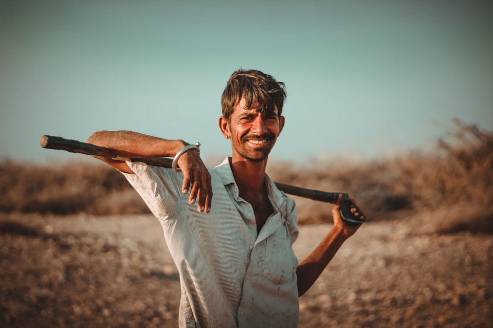 man carrying axe