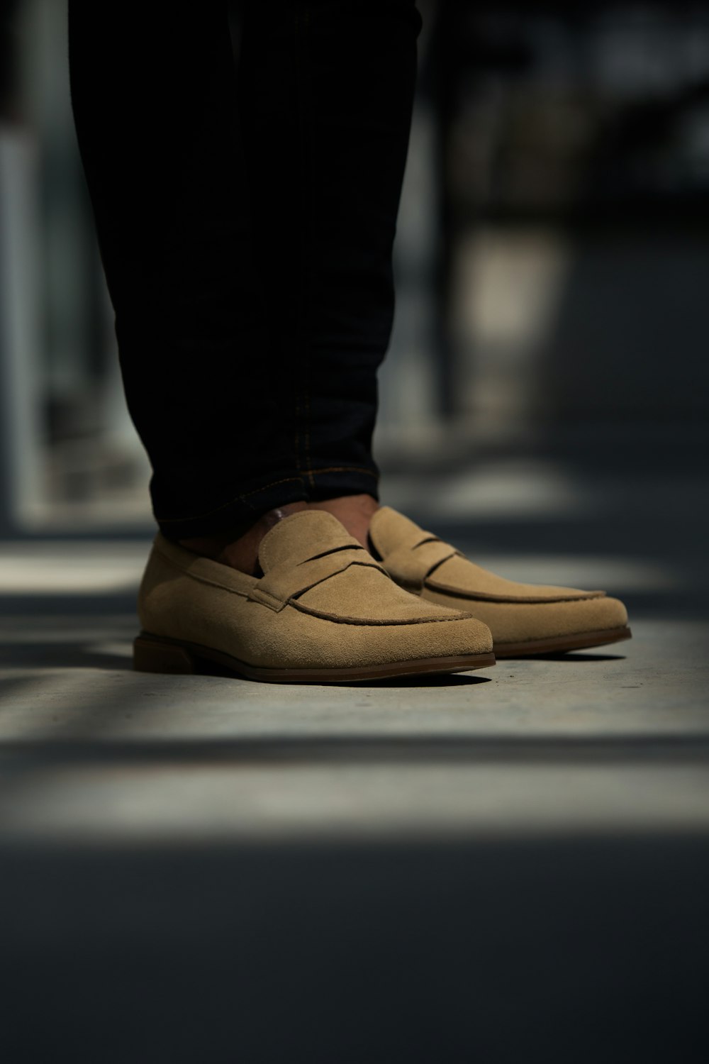 man in brown loafers