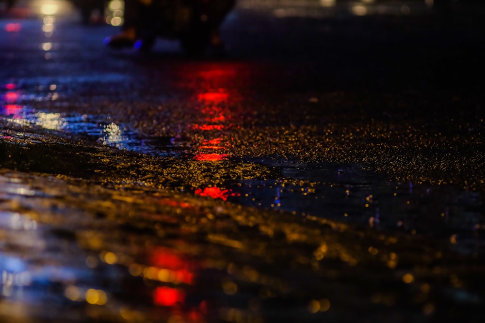 water running on grey concrete pavement