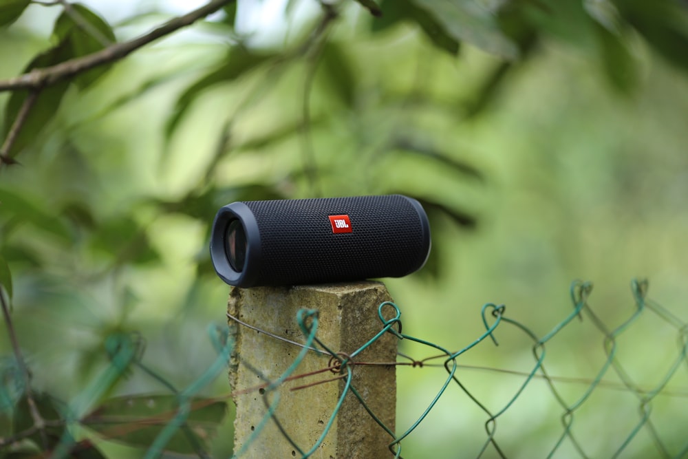 selective focus photo of black JBL speaker