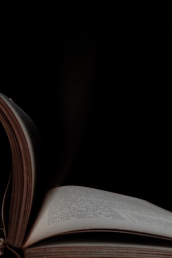 An open ebook reader showing a page of a self-help guide with elegant dark-themed design.