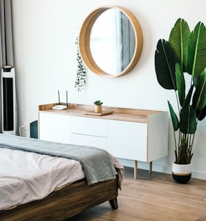 white wooden dresser with mirror