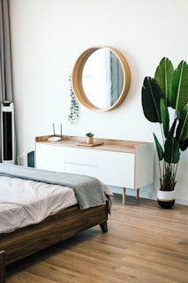 white wooden dresser with mirror