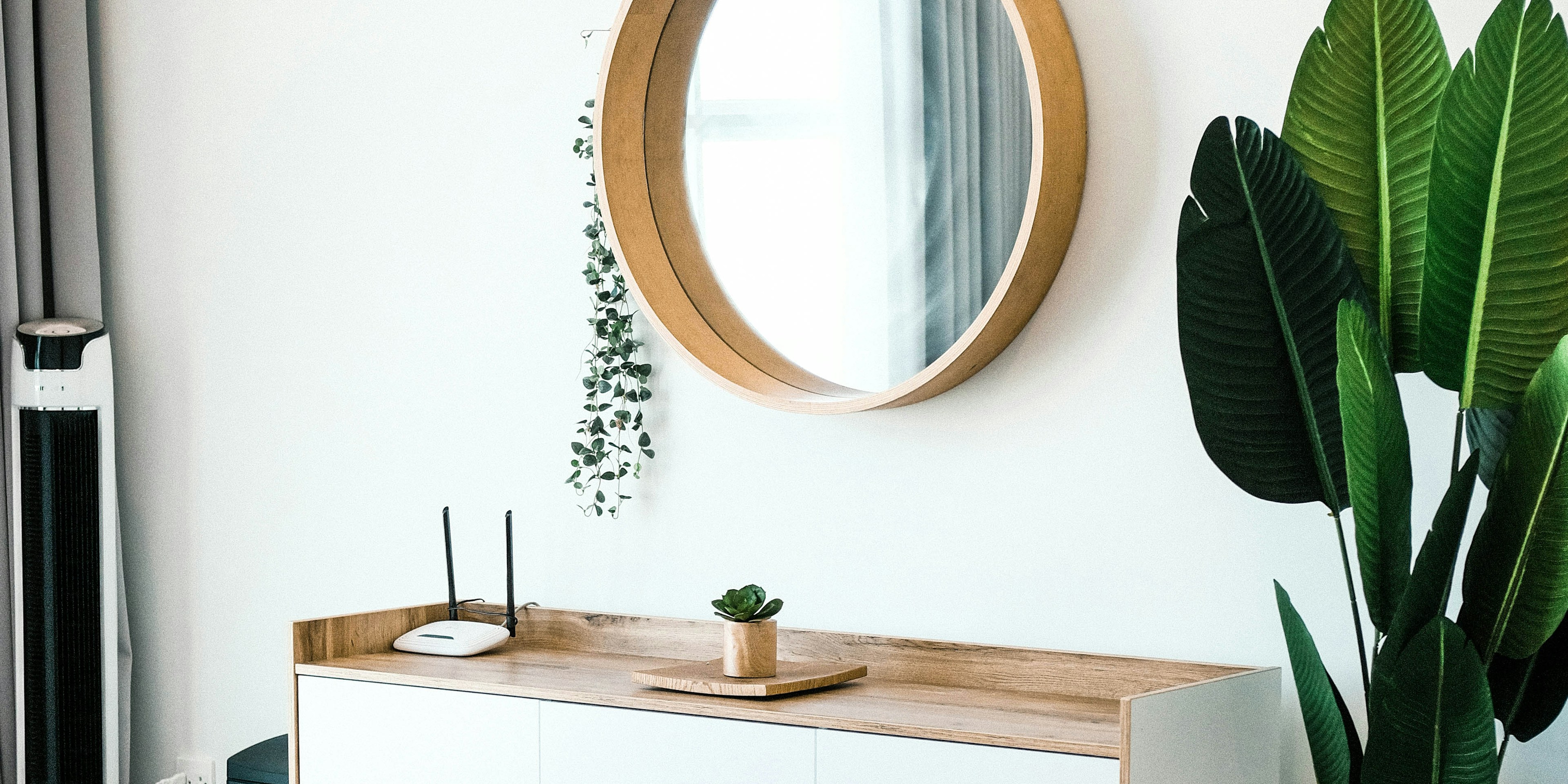 white wooden chest of drawers with mirror