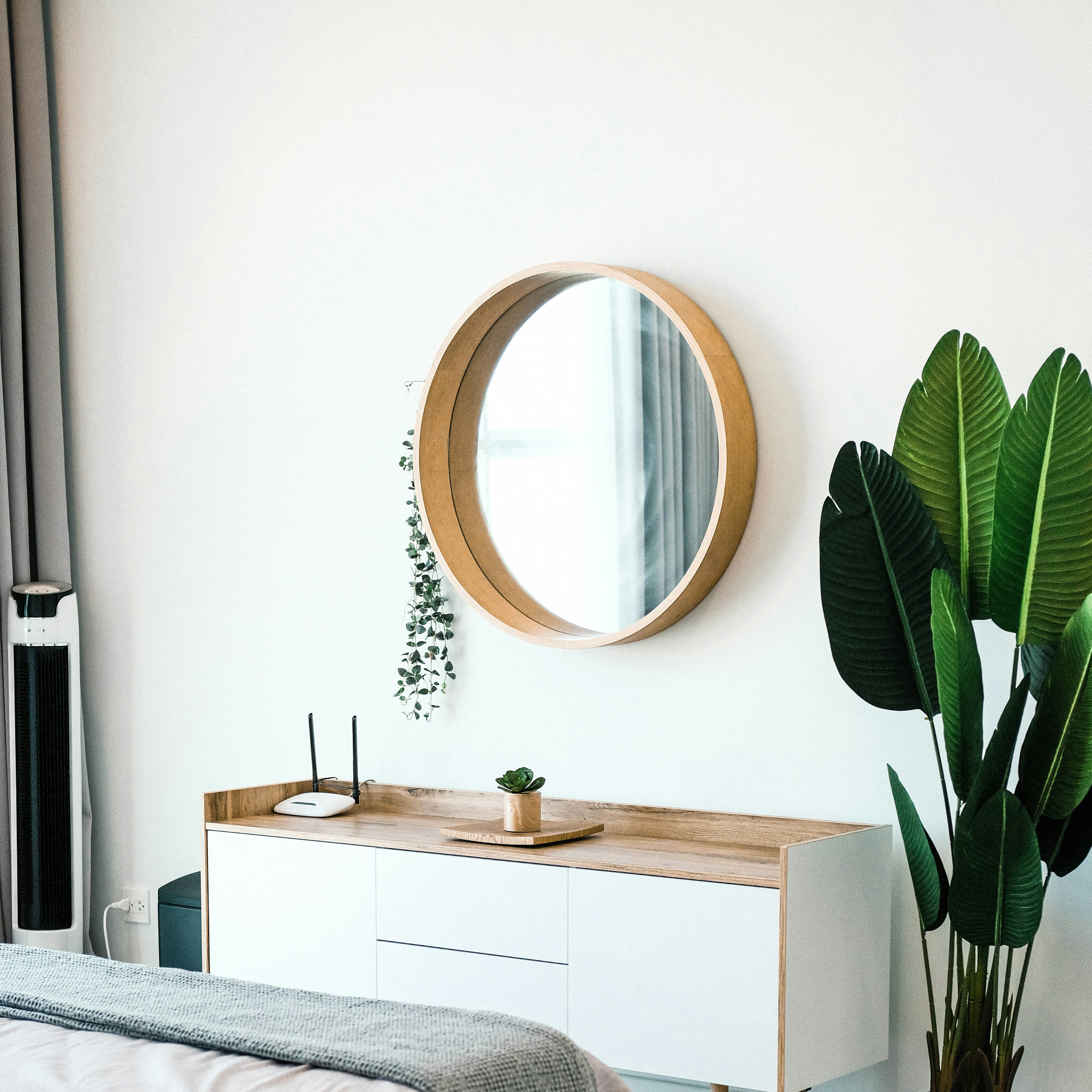 white wooden dresser with mirror