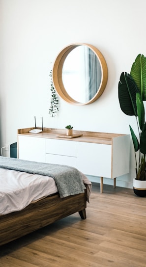 white wooden dresser with mirror