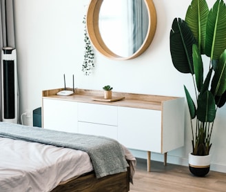 white wooden dresser with mirror