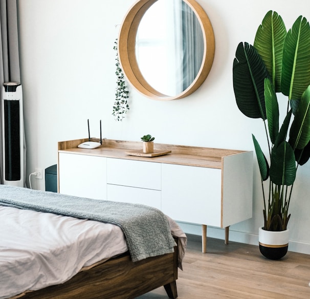 white wooden dresser with mirror