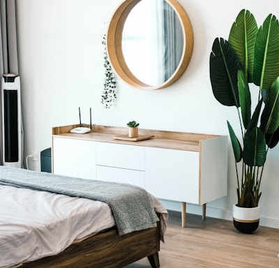 white wooden dresser with mirror