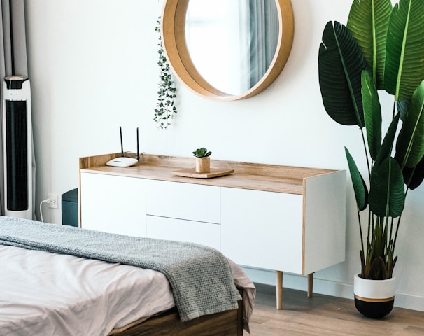 white wooden dresser with mirror