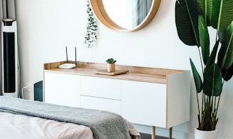 white wooden dresser with mirror