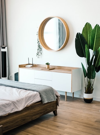 white wooden dresser with mirror