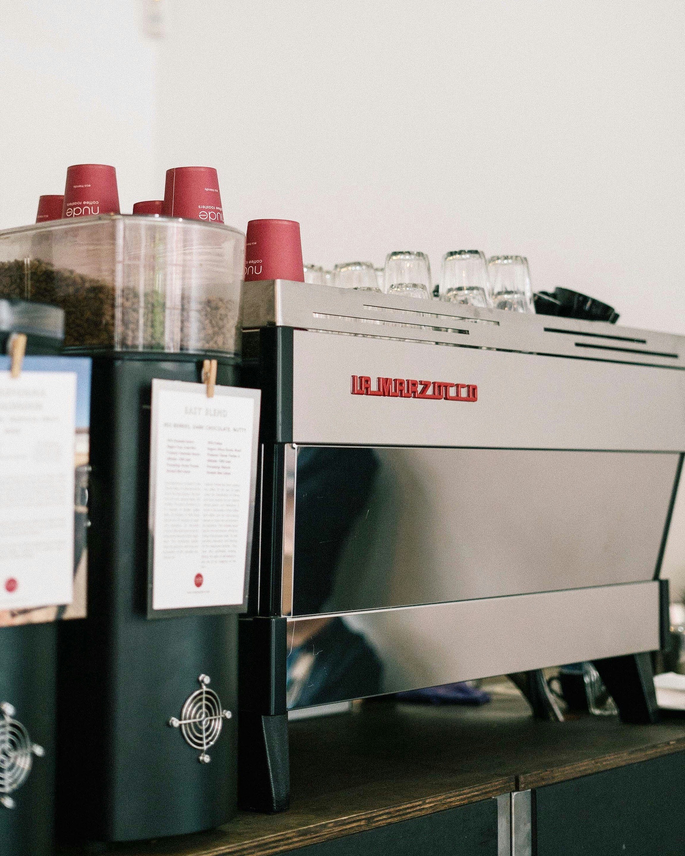 gray and green dispensers on table
