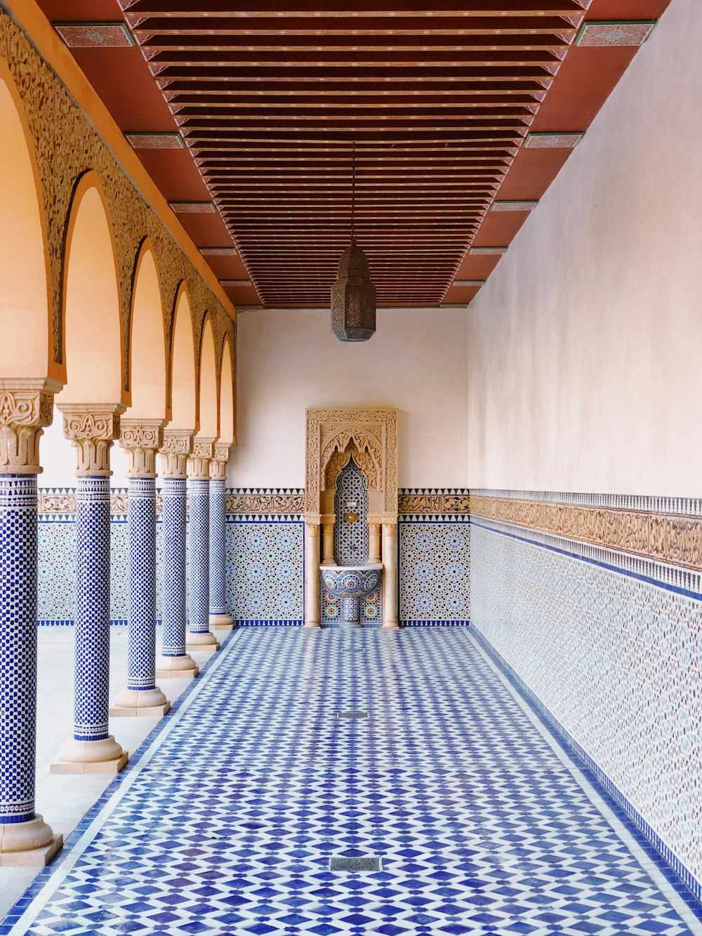 blue and white pathway inside building