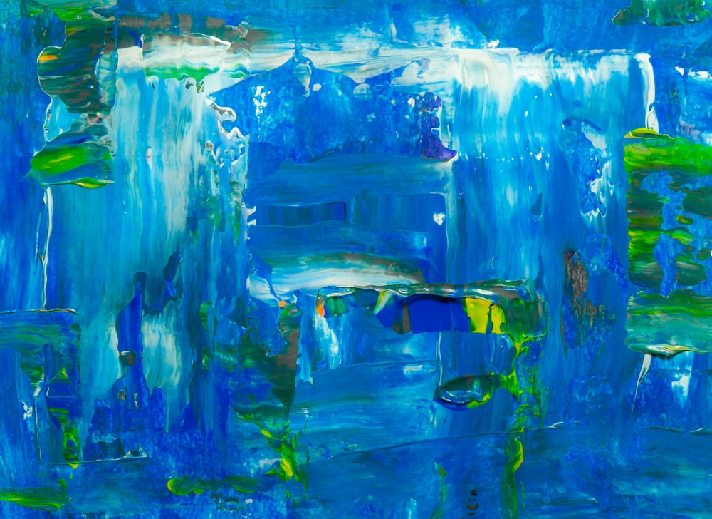 a painting of blue and green water with fish