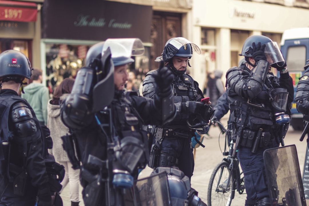 police men standing near building