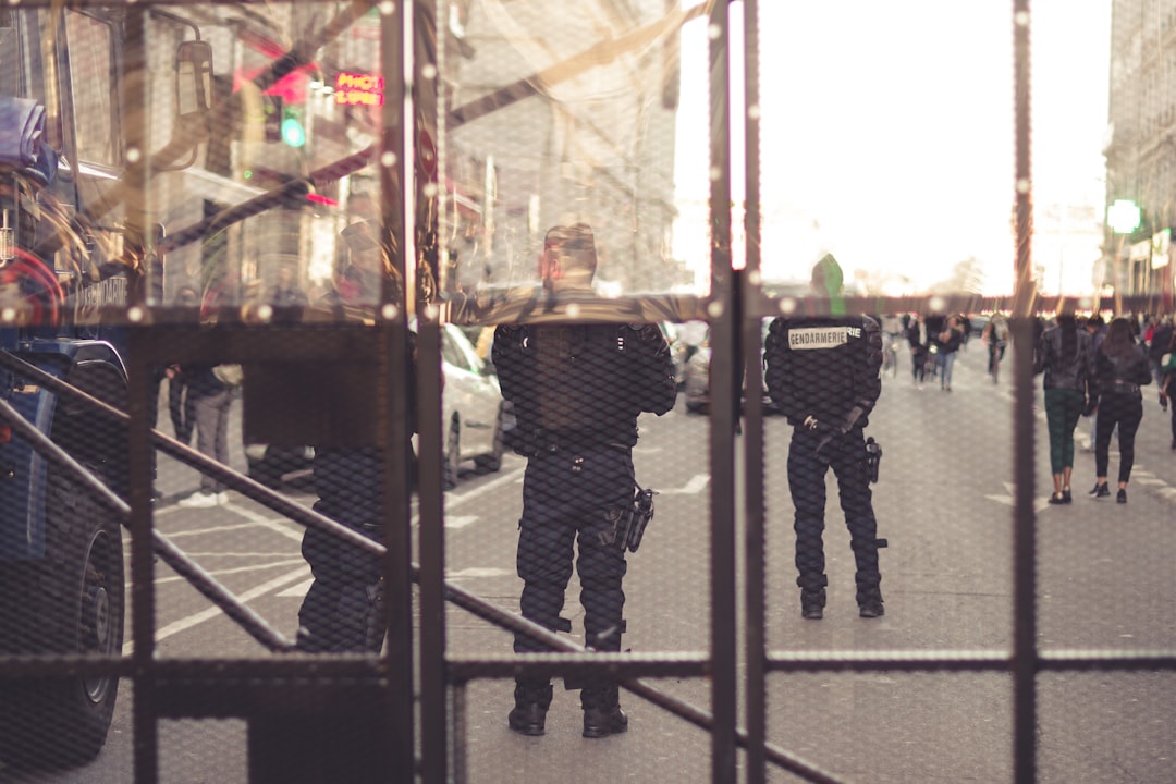 person wearing black police suit, Police barricades during the yellow vest protests in Lyon.<p></figure>Police violence is at its highest since 1968. As of now, 23 persons have lost an eye (https://pbs.twimg.com/media/D41GrQrX4AAMCB6.jpg:large). Recently an independant journalist, got arrested (https://twitter.com/GaspardGlanz).</p><p>Violence continues, even though Amnesty International and the UN condemned the use of excessive force against protesters (https://www.amnesty.org/en/latest/news/2018/12/police-must-end-use-of-excessive-force-against-protesters-and-high-school-children-in-france/).</p><p>