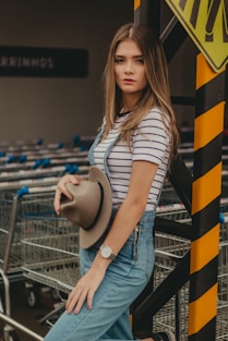 woman holding cap