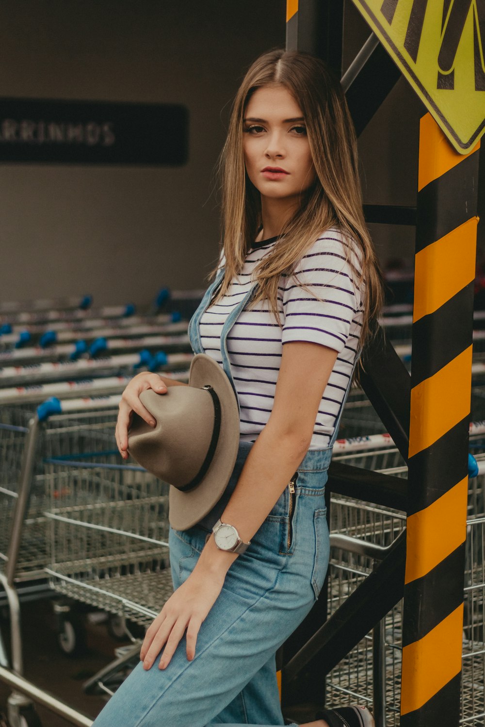 woman holding cap