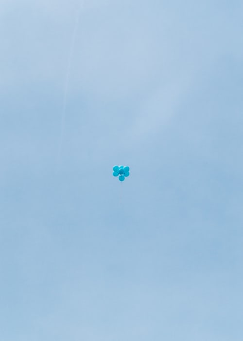blue aesthetic balloon in the sky