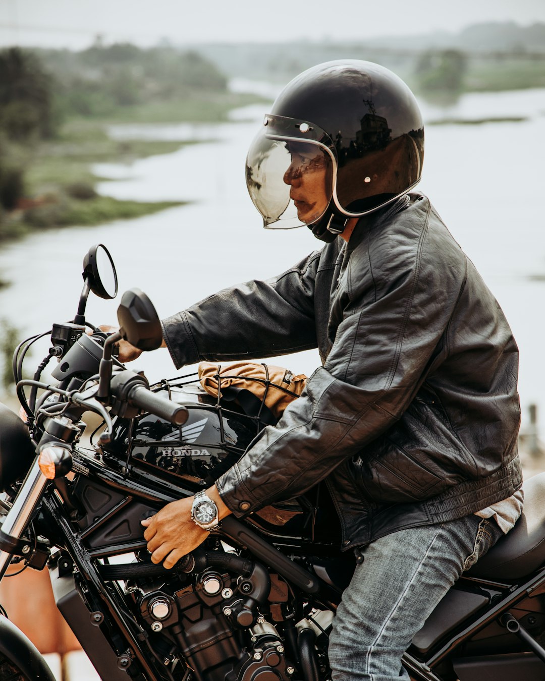 man riding on motorcycle