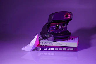 camera on top of books
