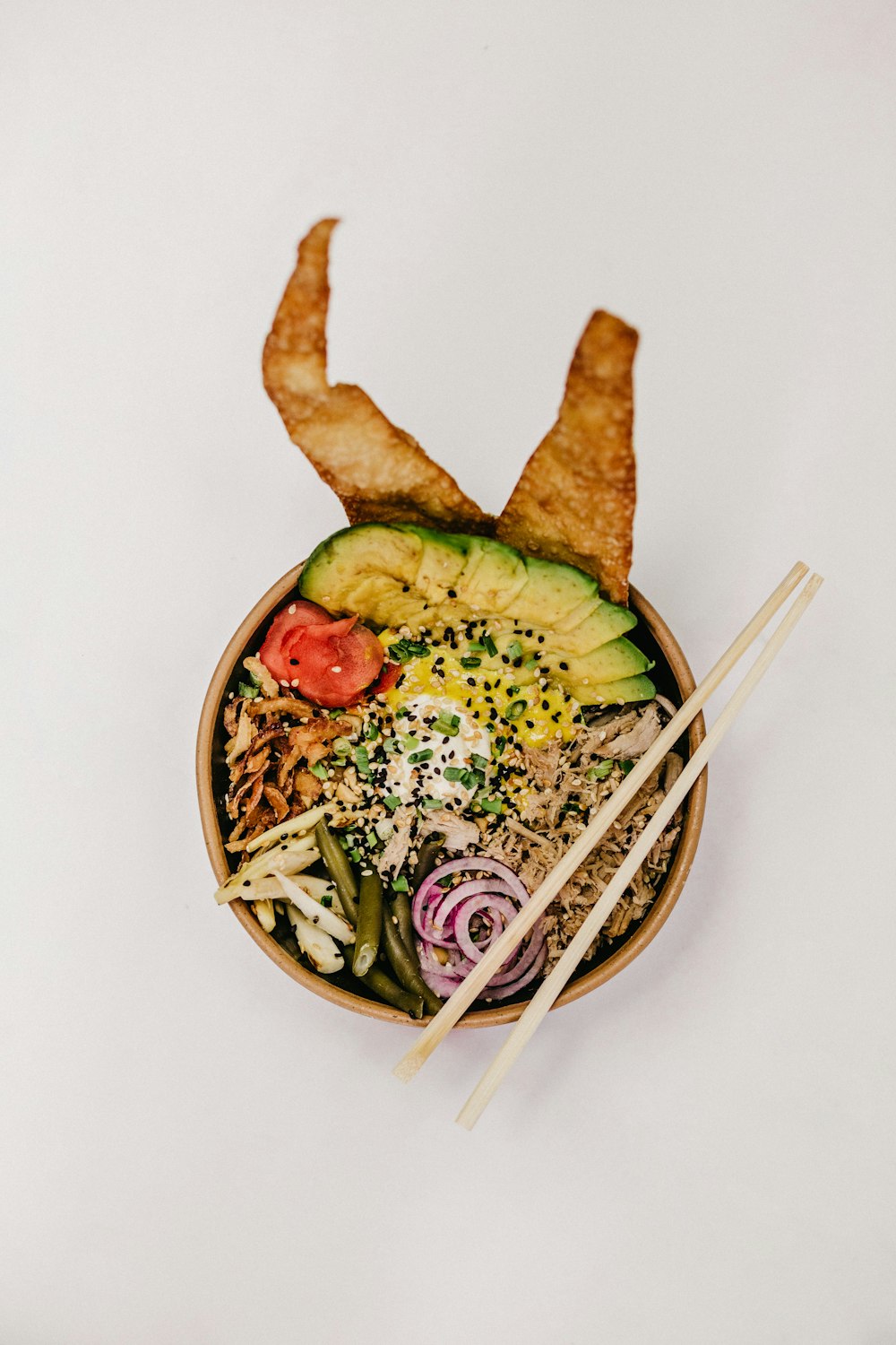 chopstick on bowl with food
