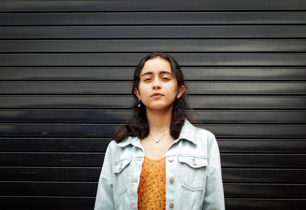 girl wearing white denim jacket