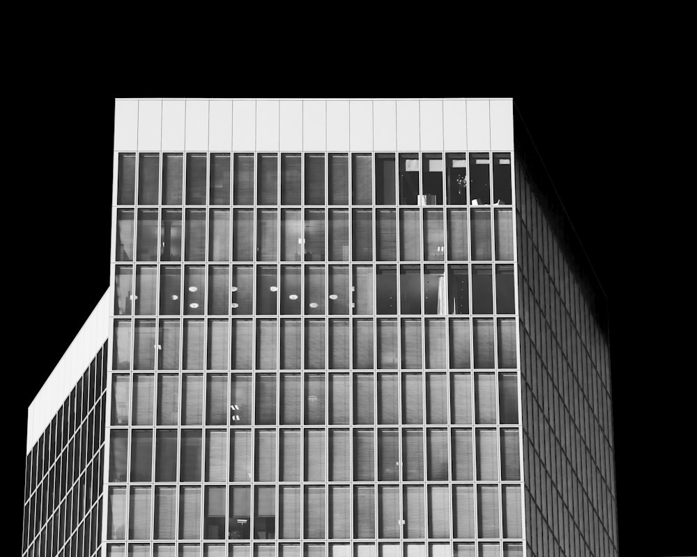 a black and white photo of a tall building