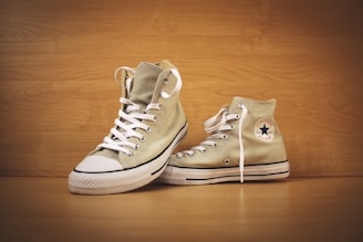 brown Converse high top shoes