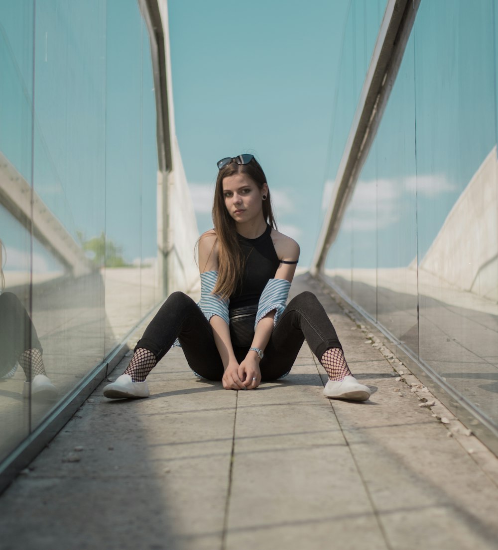 woman sitting on floor during daytime