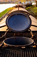 Close-up of a tank car being repaired with specialized tools