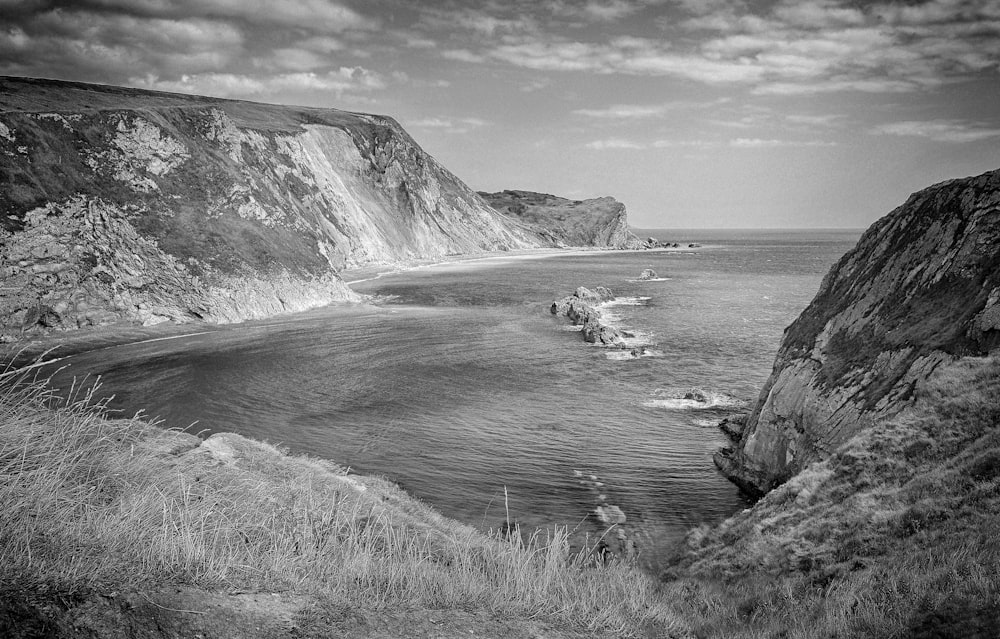 grayscale photography of cliffs