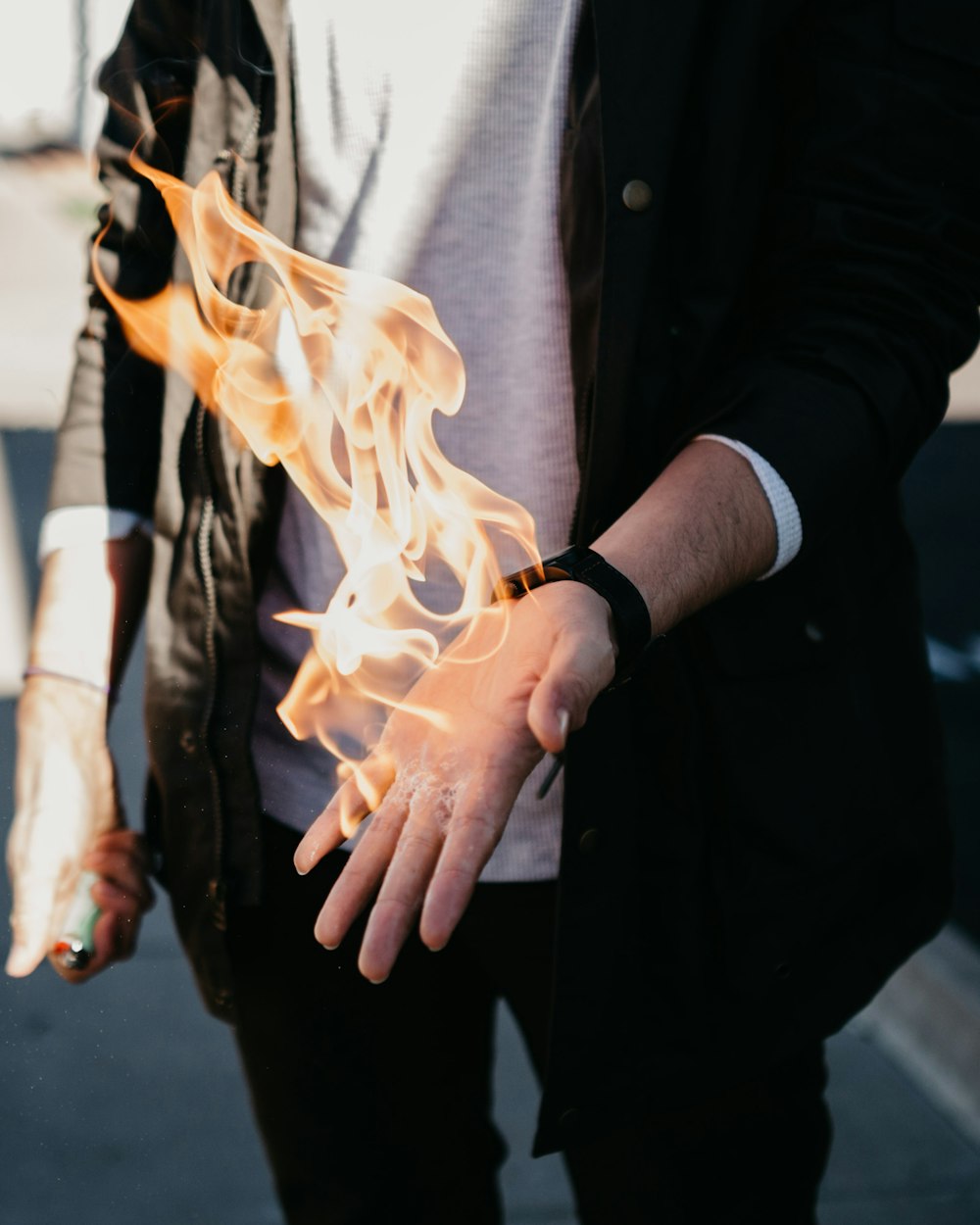 person with flaming hand