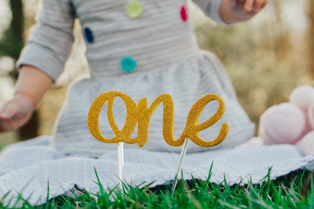 close view of toddler turning one with outdoor shot