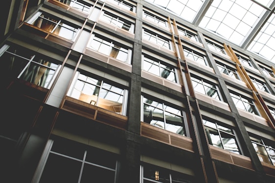 An architect carefully inspecting a modern apartment under natural light.
