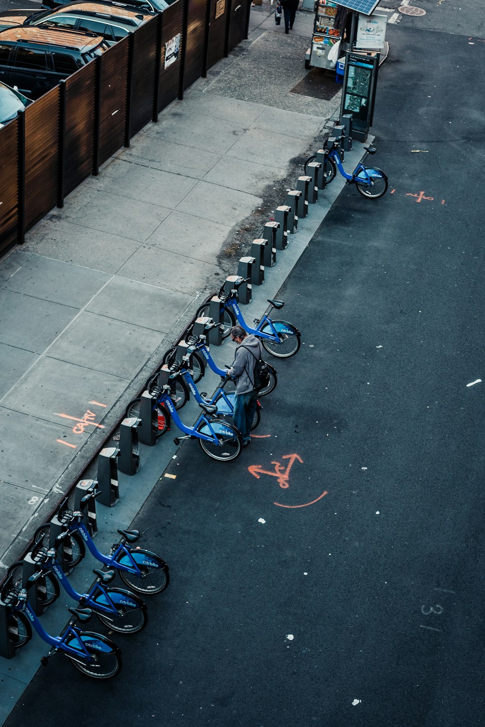 assorted bike near brown wall