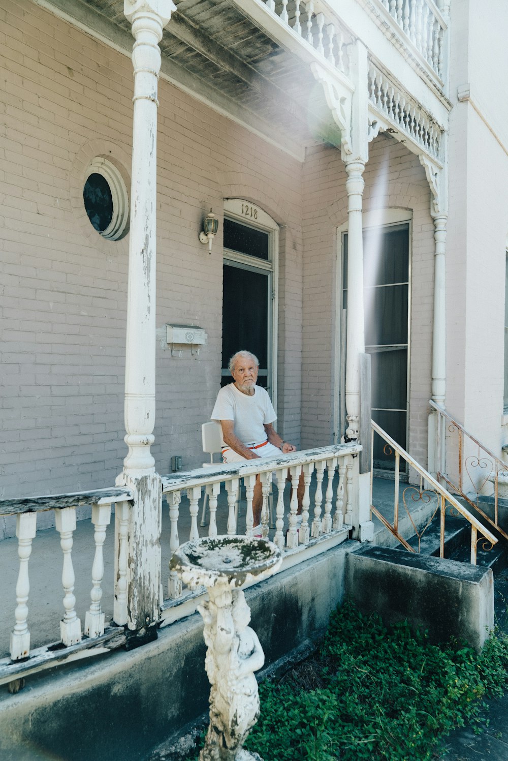 person sitting on bench during daytime