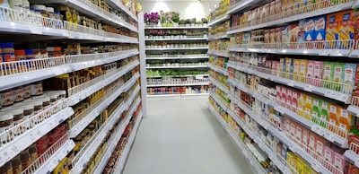 Inside aisles stocked with everyday essentials and fresh products.