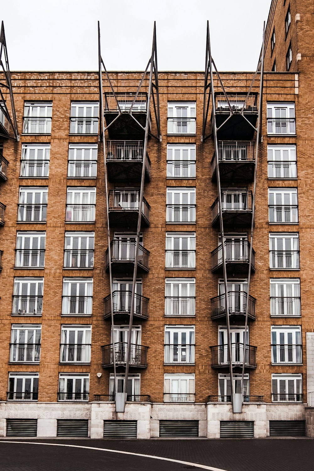 brown wooden multi-story building during daytime