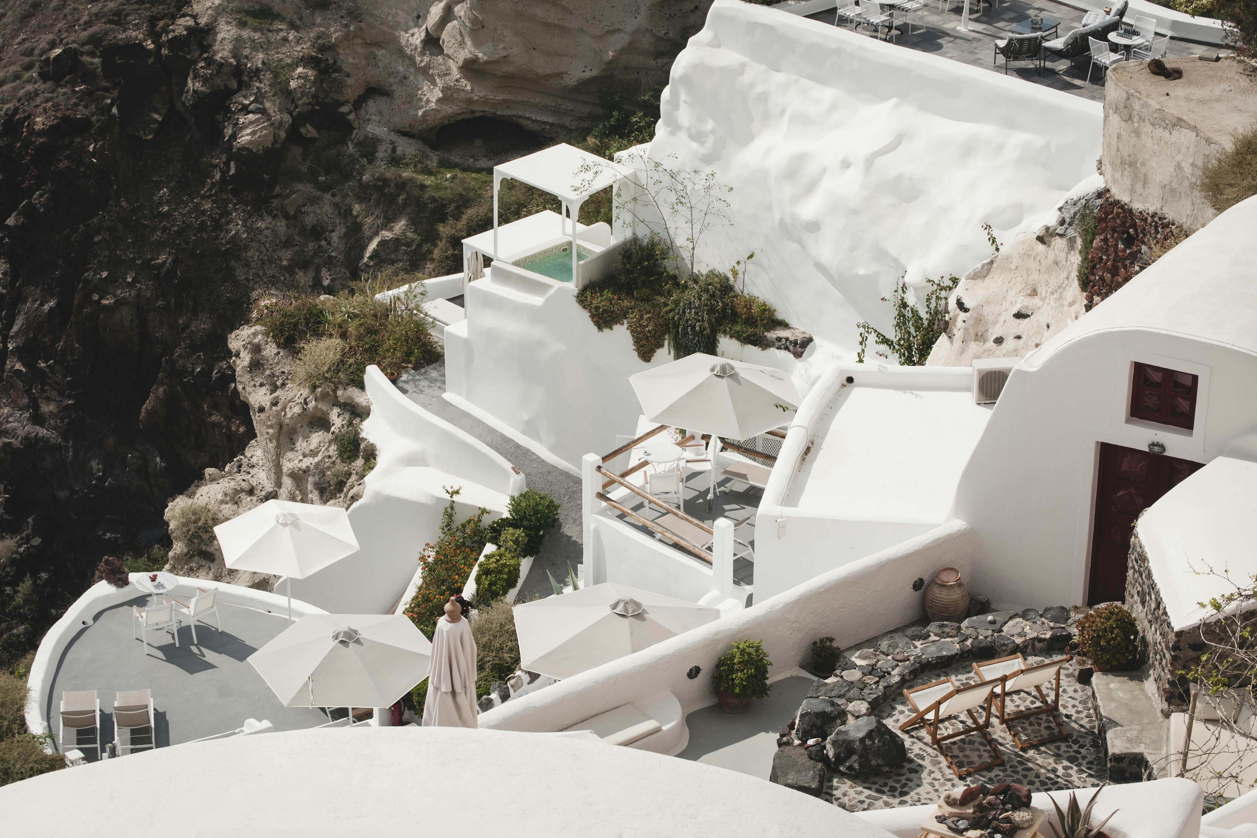 white painted building santorini teams background