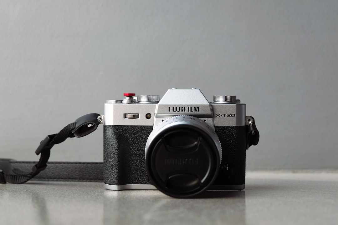 white and black Fujifilm camera