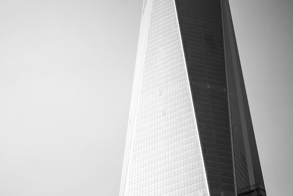 a black and white photo of a tall building