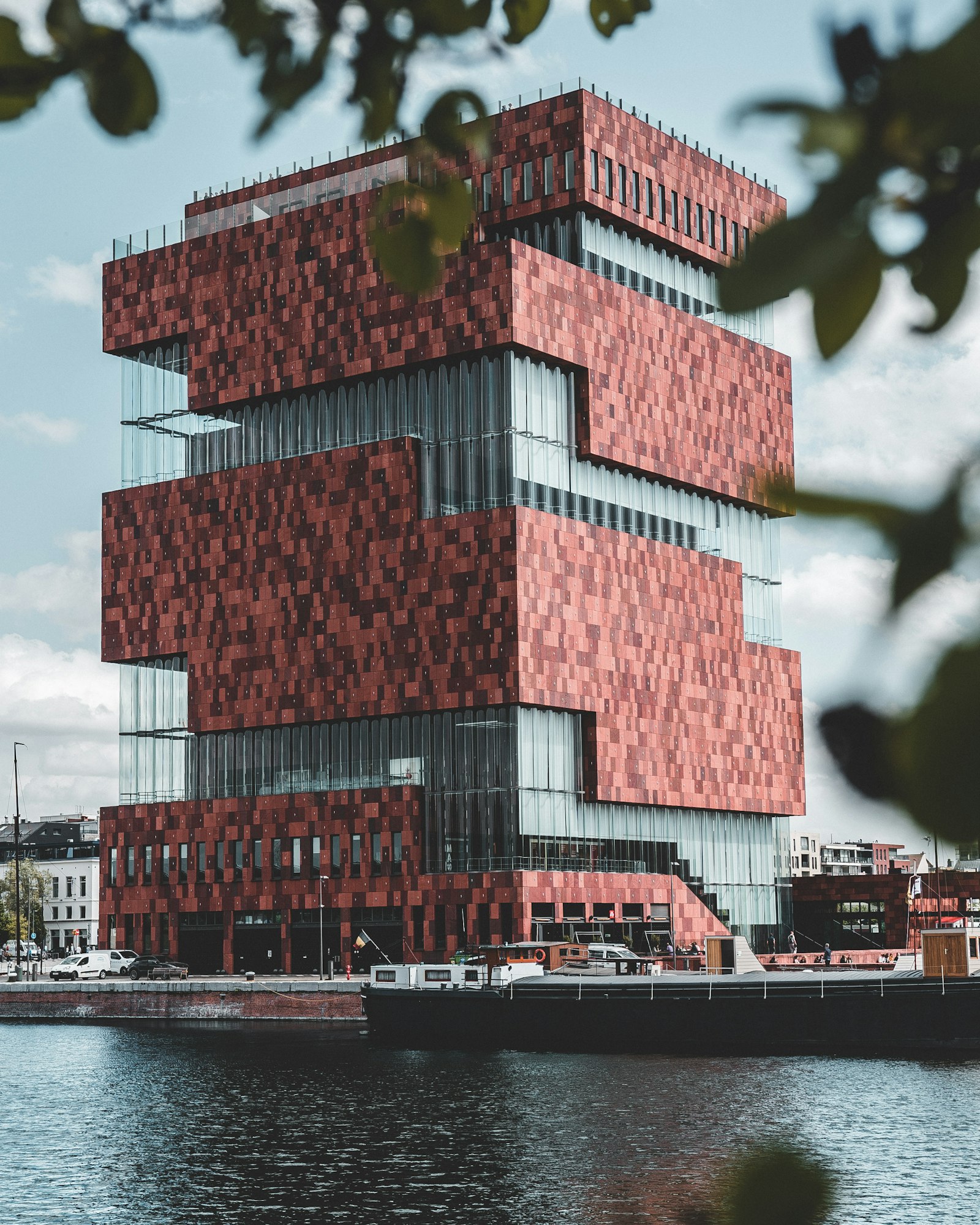 Sony a7 III + Canon 18-35mm F1.8 DC HSM | Art 013 sample photo. Red and grey building photography