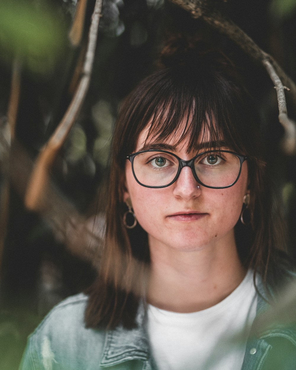 woman in black-framed eyeglasses