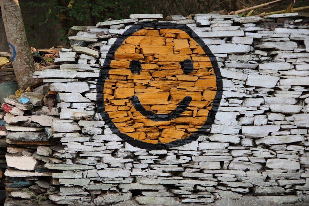 yellow and black smiley wall graffiti wall