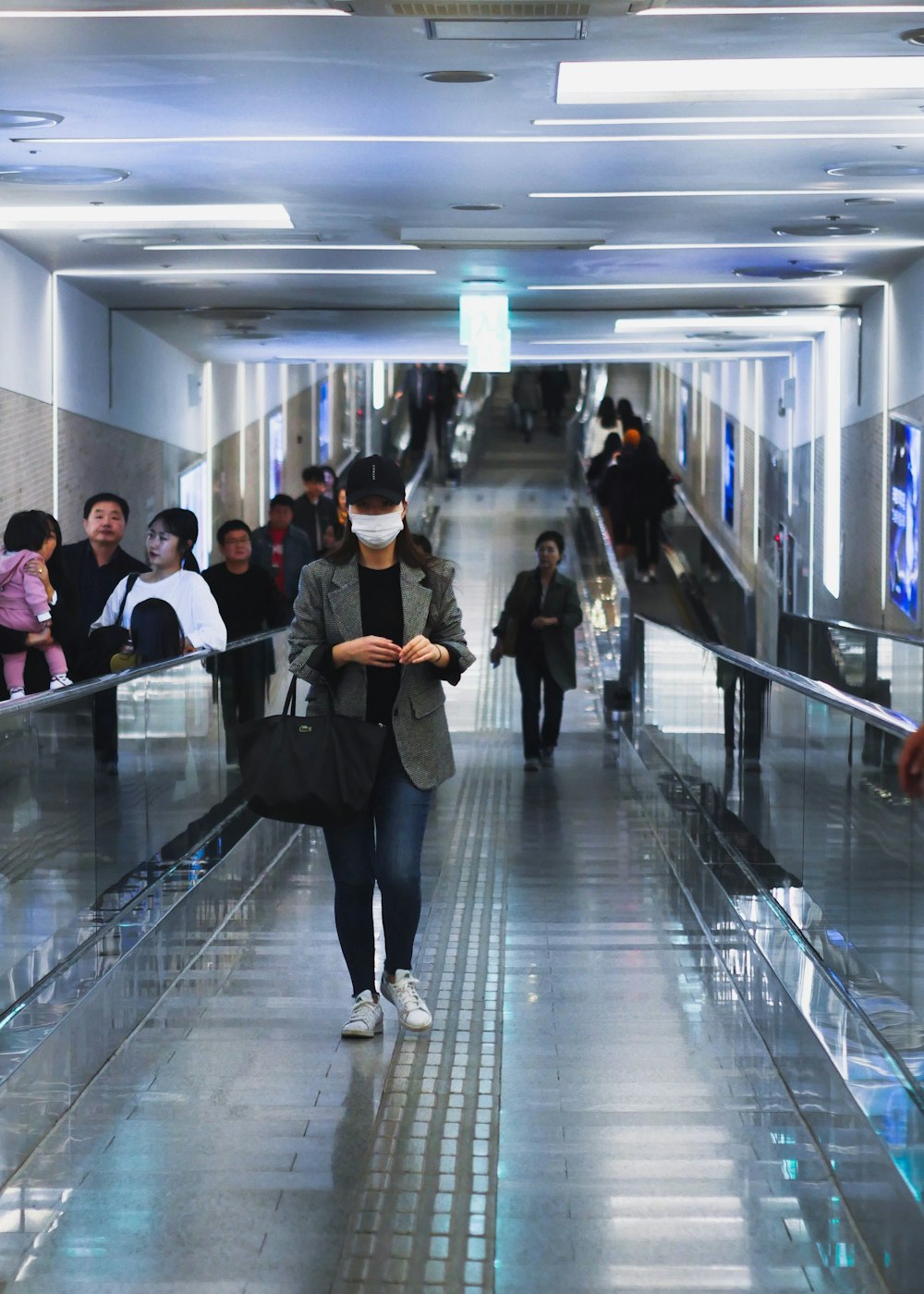 woman walking inside structure