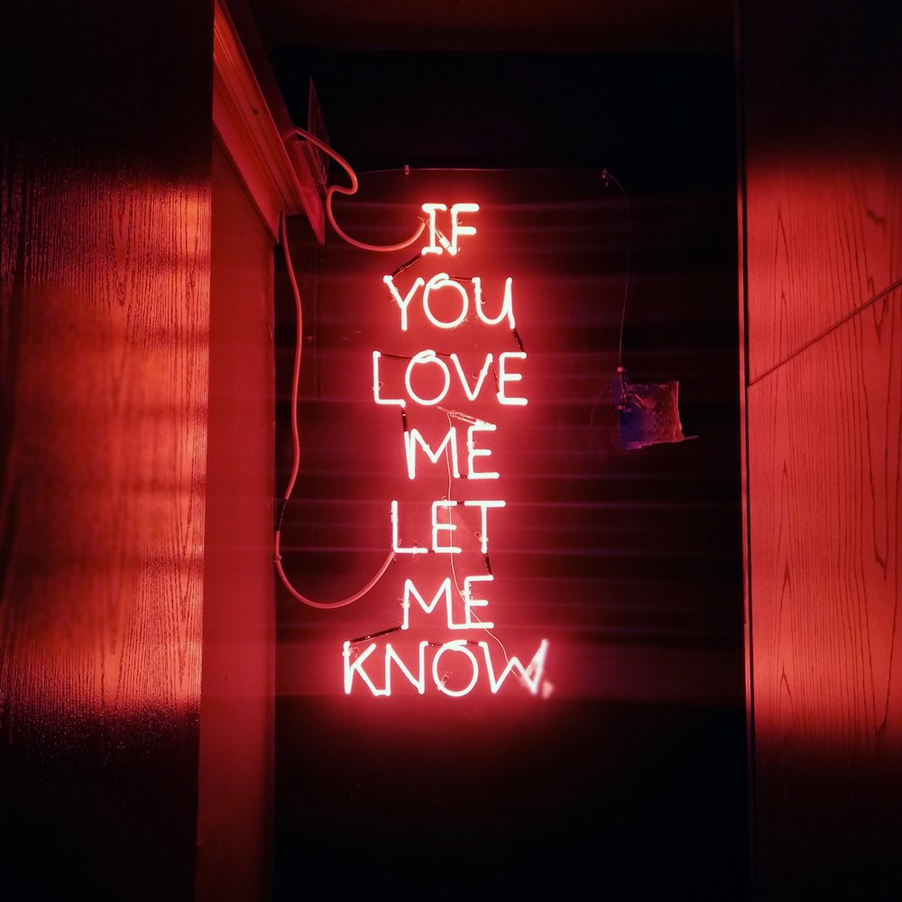 a neon sign that says if you love me let me know
